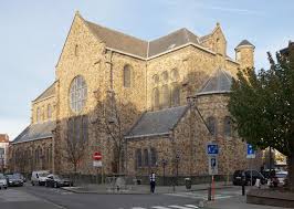 Scène urbaine de Berchem-Sainte-Agathe avec rues pavées typiques lors d'une vidange Berchem Sainte Agathe ordinaire.
